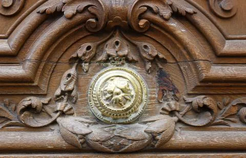 Ancient doors close up view within the historical streets of Paris . Stock Photos