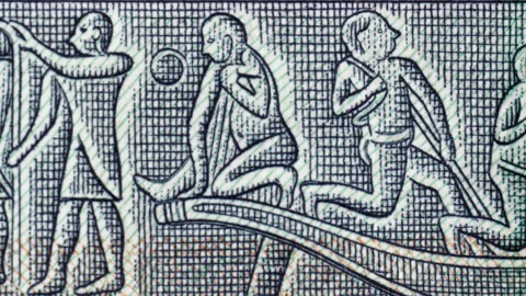 Ancient Egypt wall relief describing daily activities on Egypt 5 pound tracking Stock Footage 150328887
