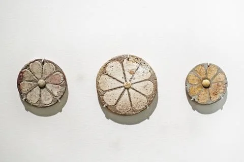 Ancient Egyptian faience rosette inserts at the National Architectural Muse.. Stock Photos