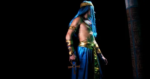Ancient egyptian god of wisdom Thoth is standing with ankh in his hand, 4k Stock Footage 123463109