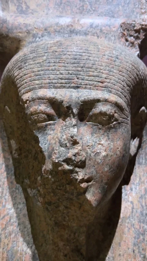 Ancient egyptian granite statue bust of a pharaoh in a museum on April 14, 2026 Stock Footage 332820044