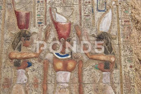 Ancient egyptian paintings on the stone plate Stock Photos