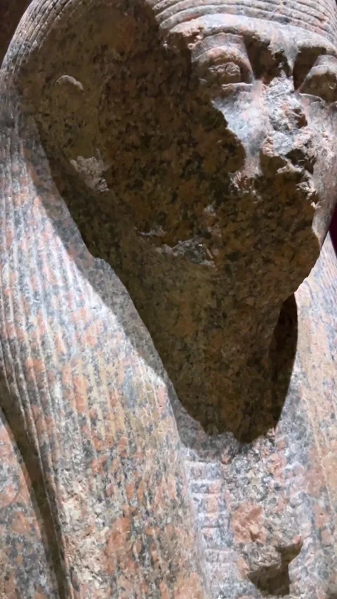 Ancient egyptian pharaoh statue head carved from stone in museum on April 14, Stock Footage 332820057
