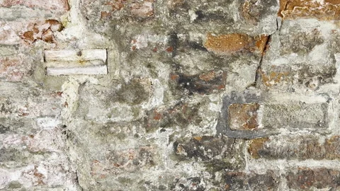 Ancient European stone wall creates textured grunge background plate Stock Footage 335945893