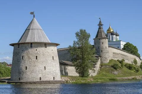 Ancient Flat Tower and Pskov Kremlin on a sunny June day. Pskov, Russia Stock Photos