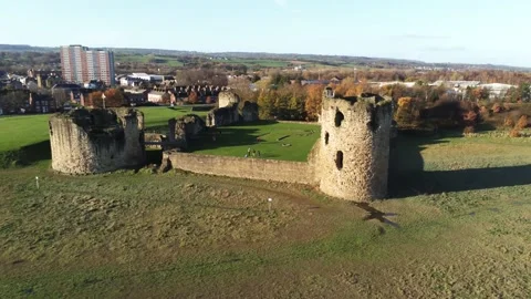 Ancient Flint castle medieval heritage military Welsh ruins aerial view Stock Footage 143830546