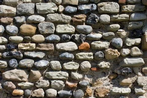 Ancient flint stone wall Stock Photos