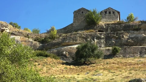 Ancient fortification on a stone ledge. Stock Footage 80406645