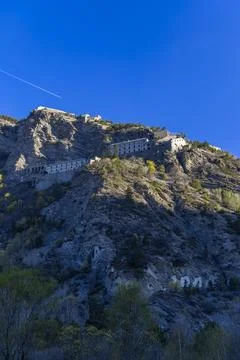 Ancient fortifications of La Condamine Chatelard blending with the mountain.. 스톡 사진