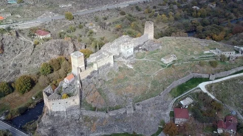Ancient fortress in the mountains, aerial photography Stock Footage