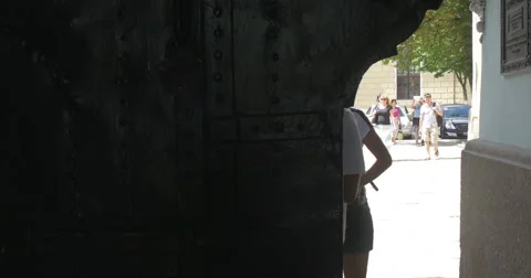 Ancient Gates and a Long Corridor Going Through a High Bell Tower of Kiev Video stock 52923823