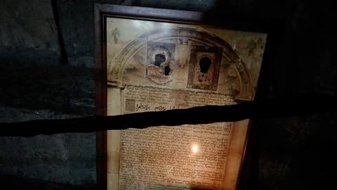 Ancient Georgian script manuscript with religious icon inside Jvari Monastery  Stock Photos