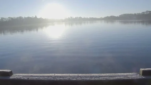 Ancient glacier lake on cold spring morning Stock Footage 75915997