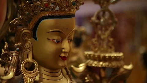 Ancient gold buddhist statue - Buddha - tilt and pan Stock Footage 79834671