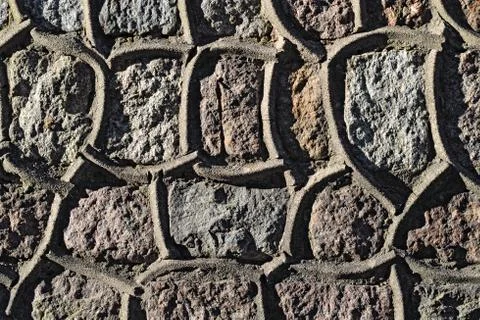 Ancient granite wall Stock Photos