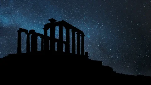 The Ancient Greek Temple of Poseidon at Cape Sounion by Night with Stars, Greece Stock Footage 102486409