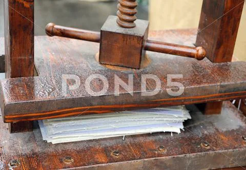 Ancient hand press for paper processing Stock Photos