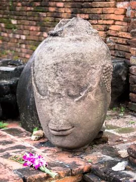 Ancient head buddha statue Stock Photos