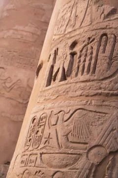 Ancient hieroglyphics on stone column Stock Photos