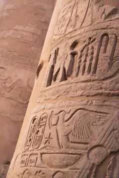 Ancient hieroglyphics on stone column Stock Photos
