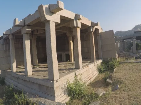 Ancient Hindu temple ruins, dynamic tracking shot along corner Stock Footage 83469238