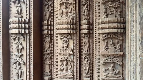 Ancient Hindu Temple Stone Relief Carvings with Mythological Sculptures in 4K Video stock 341717787