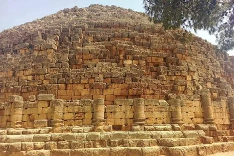 An ancient historical stone monument featuring massive stacked blocks Stock Photos