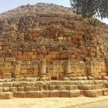 An ancient historical stone monument featuring massive stacked blocks 스톡 사진