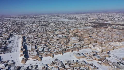 Ancient Islamic Architecture of Khiva Covered in Snow Aerial 4K Stock Footage 345814292