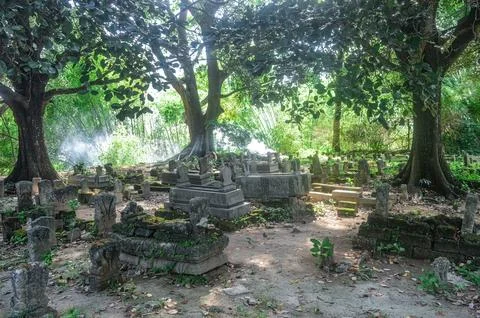 The ancient Islamic burial complex of Sunan Giri is shady with several larg.. Stock Photos