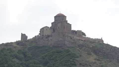 Ancient Jvari Monastery on the green mountain ridge in Mtskheta Georgia  Видео 340969677