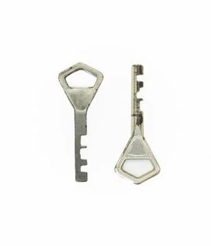 Ancient keys, used for long time. Vintage key on white background. Old key Stock Photos