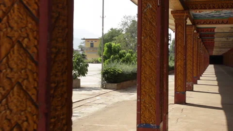 Ancient Khmer Temple Chedi Towering Over Traditional Cambodian Grounds Stock-Footage 333705756