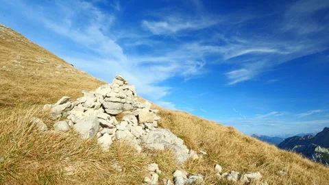 Ancient-Looking Stone Pyramids Overlooking the Enge Valley Surrounded by Vibr Stock Footage 309004782