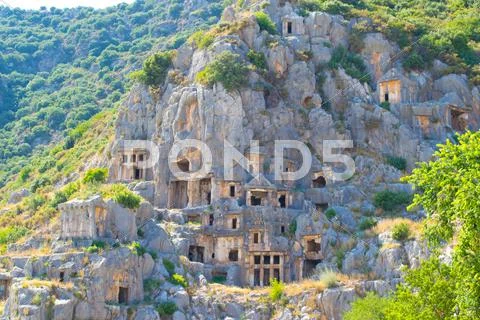 Ancient lycian Myra rock tomb ruins at Turkey Demre Stock Photos