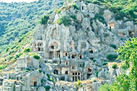 Ancient lycian Myra rock tomb ruins at Turkey Demre Stock Photos
