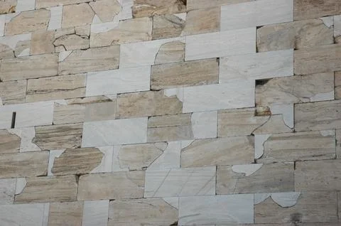 Ancient marble blocks texture of the historic wall at Acropolis in Athens G.. Stock Photos