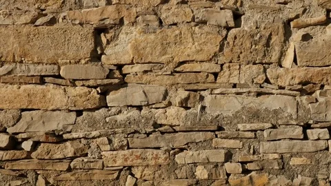 Ancient masonry construction close-up slow tilt Stock Footage 80943417