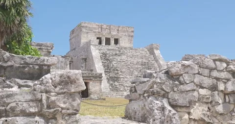 Ancient Mayan Ruins of Tulum Under a Clear Blue Sky in Quintana Roo, Mexico Stock Footage 271573886