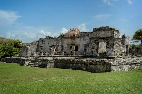 Ancient mayan temple complex with stone walls in tulum mexico Stock Photos