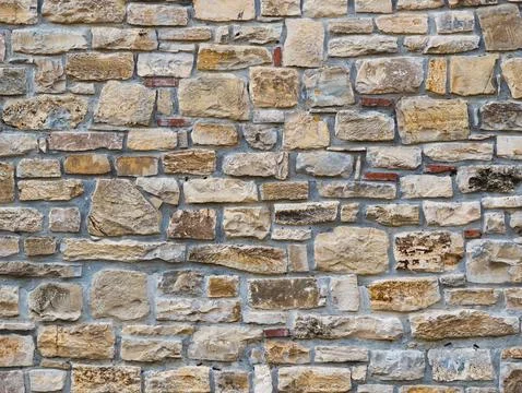 Ancient medieval stone wall texture background Stock Photos