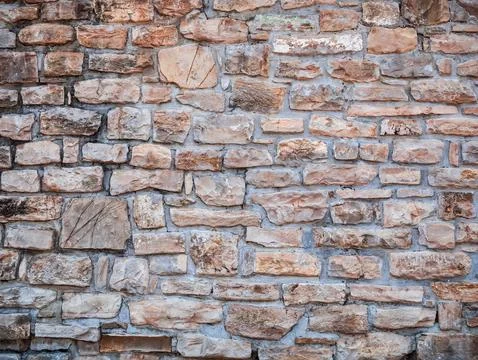 Ancient medieval stone wall texture background Foto stock