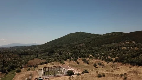 Ancient Messini - drone flying down to grave and stadium  Stock Footage 113427115