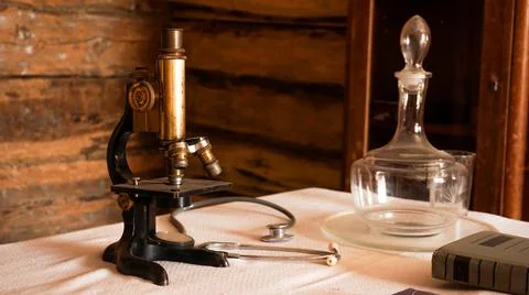 Ancient microscope in an old authentic laboratory. Stock Photos