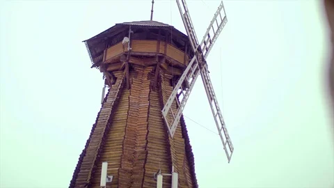 An ancient mill. The mill is made of wood. Stock Footage 73923807