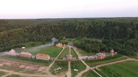 Ancient monastery near the forest 库存影片 73695428