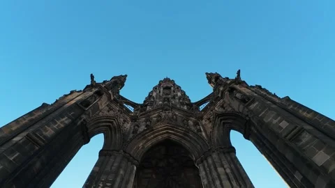 Ancient monument with a bird flying, Scott monument Stock Footage 329276412