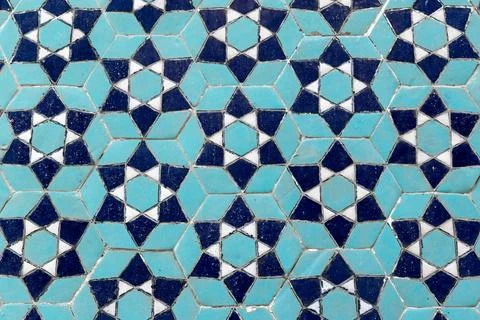 Ancient mosaic wall with Arabic pattern, geometric decoration Stock Photos