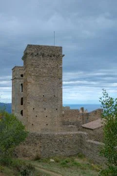 Ancient mountain monastery on the cloudy blue sky background Stock Photos