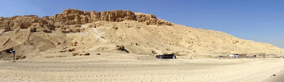 Ancient mountains of the former funerary temple of Hatshepsut in Egypt unde.. Stock Photos